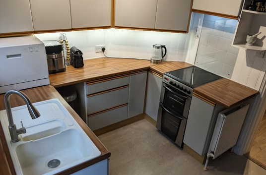 This home is arranged over three floors and has shed loads of character.