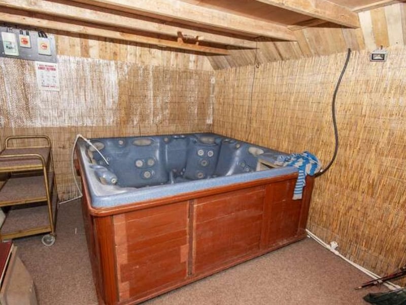 A spa room, featuring a hot tub, is based in a converted integral garage, where you will also find a small changing cubicle and shower