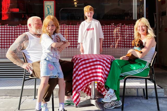Civerinos owner Michele Civiera, pictured left, with his family outside the new branch in Stockbridge, Edinburgh.