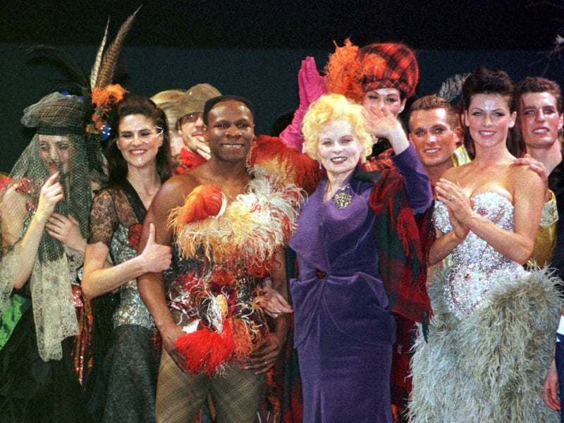 British boxing star Chris Eubank poses next to designer Vivienne Westwood who showed her collection on the catwalk outside London for the first time in January 1999. Ms Westwood's Spring/Summer collection of fashion was revealed at the Scottish Exhibition and Conference Centre in Glasgow