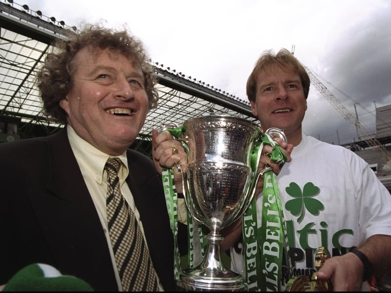 Celtic Coach Wim Jansen and Murdo MacLeod celebrate after a Scottish Premier League match against St Johnstone at Celtic Park. Celtic won the match 2-0 to become the league champions.