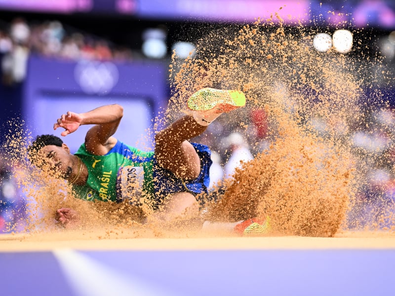 Brazil's Almir dos Santos competes in the men's triple jump qualification of the athletics event