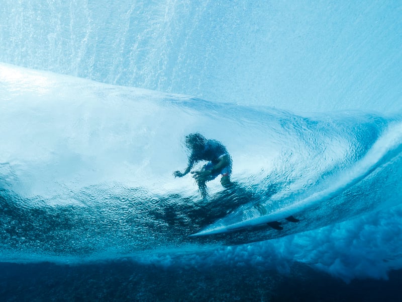 A surfer takes part in a surfing training session in Teahupo'o