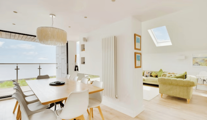 The listing says: "The property offers a wealth of high tech features such as hardwired and wifi connectivity in every room and smart heating including underfloor."