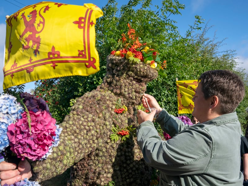 The Burryman’s journey began at 9am when he emerged from the Stag Head Hotel on the High Street, and covers about nine miles, with 20 stops