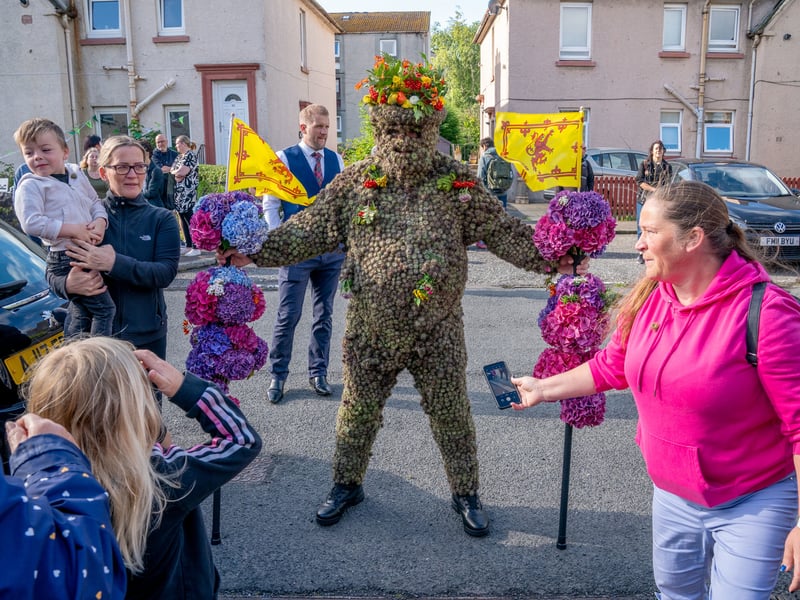 The Burryman attracts a host of onlookers. The festivities are thought to date back about 400 years and are believed to have originally celebrated the harvest or the changing of the seasons