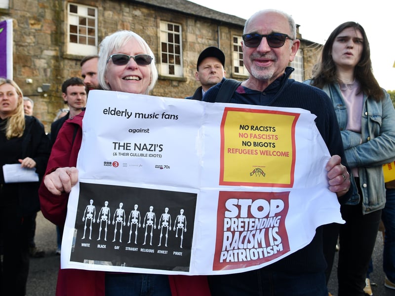 Two protesters at the Paisley demonstration. John Swinney has also told social media giants “immediate action” must be taken to crack down on disinformation and racism following concerns it has exacerbated tensions in other parts of the country