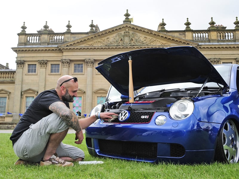 Andy Taylor of Tadcaster polishes his Lupo GTI  in raven blue. (pic by Steve Riding / National World)