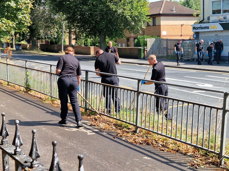 Pictures showed officers using specialist equipment to comb the area in coordinated groups.