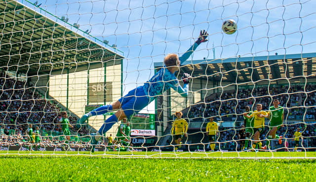 Celtic remain top of the table after their 2-0 win over Hibs at Easter Road.