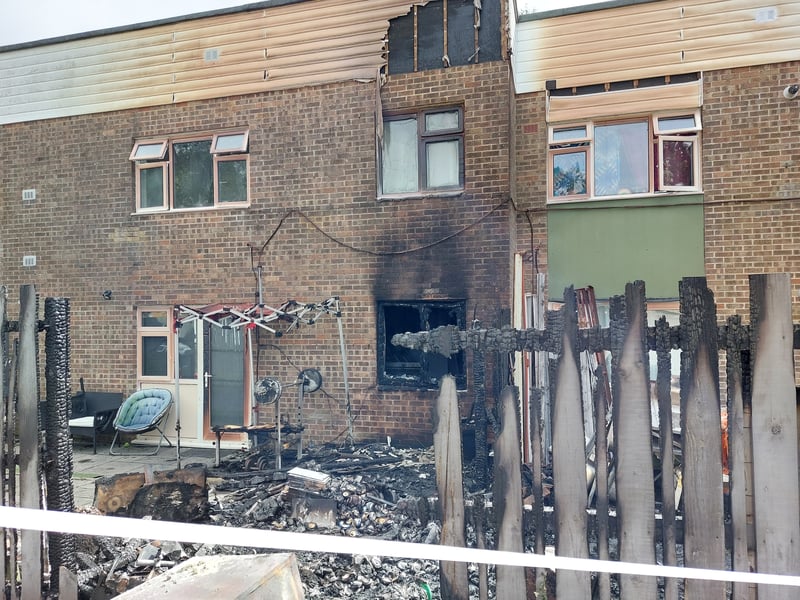 One flat received significant smoke damage with fire crews using ventilation fans to clear.