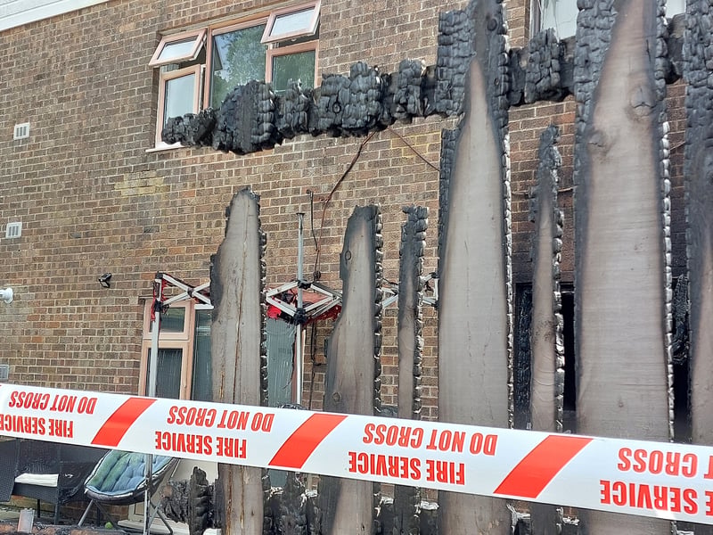 The fence and shed caught fire before spreading to the property.