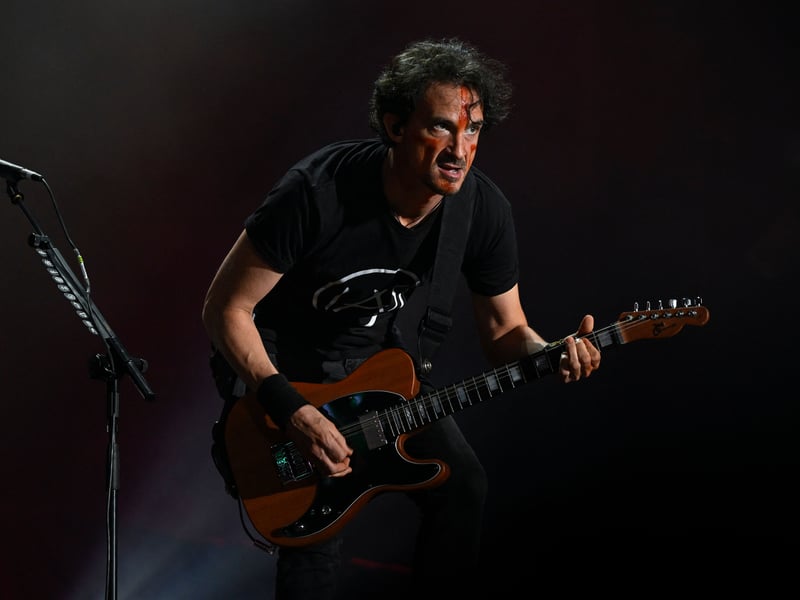 Gojira's French guitarist Joe Duplantier performs during the band's concert at the Main Stage of the Rock in Rio music festival at the Olympic Park in Rio de Janeiro, Brazil, on September 2, 2022.
