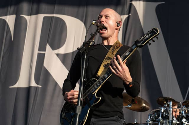 Matthew Kiichi Heafy of Trivium performs on stage at the Germania Insurance Amphitheater in Austin, Texas on August 20, 2021.