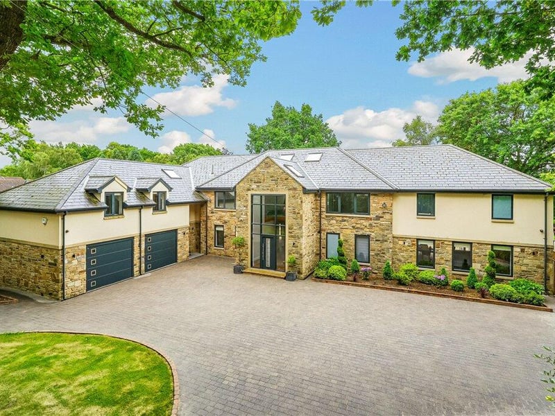 This truly unique home has a total of eight bedrooms, an indoor pool and a sauna, and is on the market for £3,250,000.