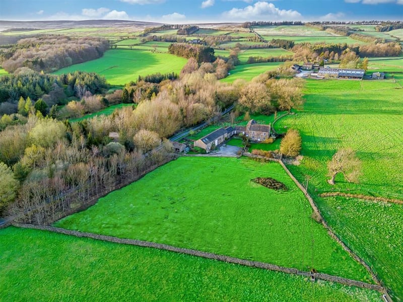 This traditional stone built farmhouse surrounded by open countryside is for sale with a guide price of £1,800,000.