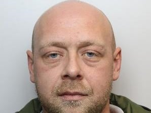 Two brothers who were at the front of a mob attacking police officers guarding a hotel housing more than 200 asylum seekers have each been jailed for three years.

Luke and Paul Sissons were involved a range of violent incidents outside the Holiday Inn Express, in Manvers, Rotherham , on August 4 , including an attack on a police dog van and violent confrontations with riot officers, Sheffield Crown Court heard on Friday.

Paul Sissons - who is a tunnelling team leader on the HS2 project - was filmed over a period of nearly four hours, first in a mob shouting at police and chanting " Tommy Robinson ", a judge was told.

Sissons, 37, of Two Gates Way, Barnsley , was then captured as part of a group that violently rocked a police van with officers and a dog inside, and was later seen throwing missiles at a group of cornered officers.

Body-worn camera footage from an officer holding a riot shield was also shown to the court of Sissons angrily kicking and pushing at the police line as they tried to push the crowd back.

His brother Luke Sissons , 34, of The Green View, Shafton, Barnsley , was also part of the mob rocking the van, and footage was shown of him at the front of group goading officers with riot shields who were pinned against the hotel wall.

Video was also shown to the court of Luke Sissons talking to a police officer before the main violence began.

He tells the officer he is a "wanker" and then asks him: "Why do you run away from immigrants, but when we do anything you f****** cosh us?"

Sissons also tells the officer: "I f****** hate police officers. You're grasses," and: "I f****** hate immigrants."

Dermot Hughes , defending both brothers, pointed out that they were both hanging their heads in shame on the videolink as the footage was shown to the judge.

He said they are both "thoroughly ashamed of their parts in this".

Mr Hughes said Paul Sissons , who shouted that he was not a racist on the prison videolink during the hearing, had had a well-paid job which was now in jeopardy, stressing that he was very well thought-of by his employers.

The Sissons brothers are the latest of more than 20 men who have now been jailed at Sheffield Crown Court by Judge Jeremy Richardson KC following the Manvers disorder, which saw 58 police officers, three police dogs and a police horse injured, and involved rioters breaking into the hotel and trying to set the building alight.

Judge Richardson said to the brothers: "You were right at the front of the mob attacking those police officers."

Referring to the footage of the small group of officers coming under attack against the wall of the hotel, he said: "It never ceases to frighten me, and I have the advantage of watching it days after the event in the security of this court room.

"It was a frightening incident and the young officers who were on that cordon must have been terrified by that mob."

Both men pleaded guilty to violent disorder at a previous hearing.
