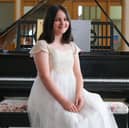 Xenia, aged 11, pictured playing piano at Wesley Hall in Crookes. Her music talents have seen her earn a place at the prestigious Chetham's School of Music.
