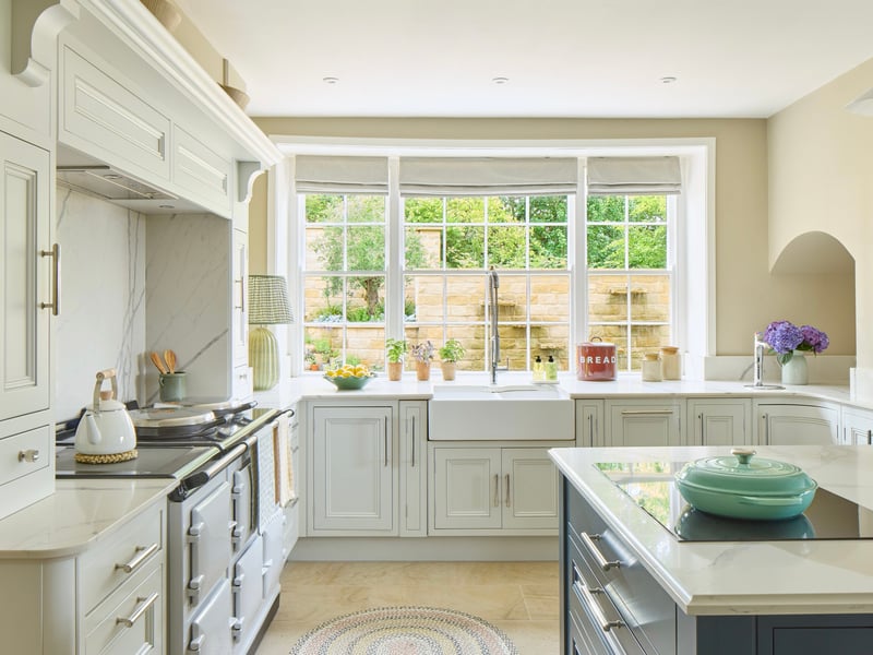 Adjacent to the kitchen are several store rooms including a traditional pantry with stone slab shelving.