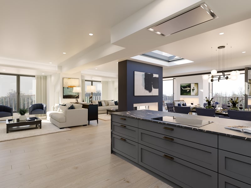 The Edinburgh penthouse features a stylish and practical kitchen with its own breakfast bar. A dual aspect fireplace separates the main lounge area from the dining space