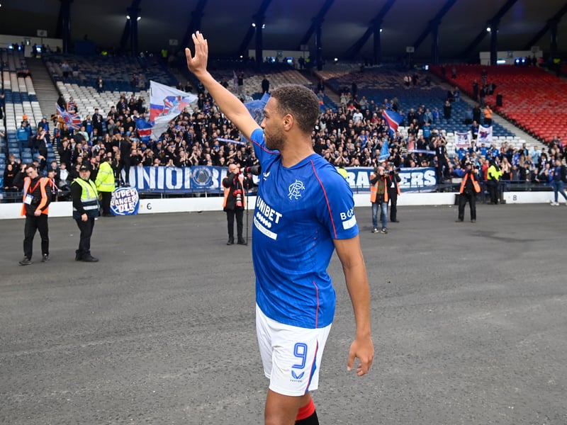 Cyriel Dessers waves to the Hampden Park crowd.