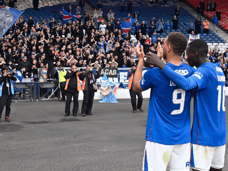 Cyriel Dessers and Mohamed Diomande thank those who have stayed behind to support them.