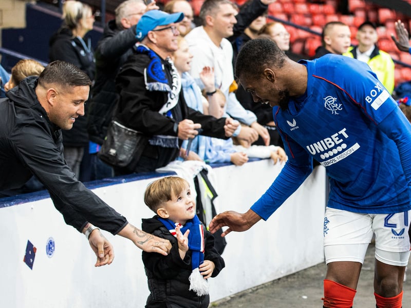 Dujon Sterling says hello to a young Rangers supporter following the win over St Johnstone.
