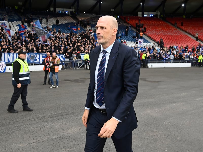Philippe Clement surveys the Hampden Park crowd as he watches his Rangers players unite with the fans.