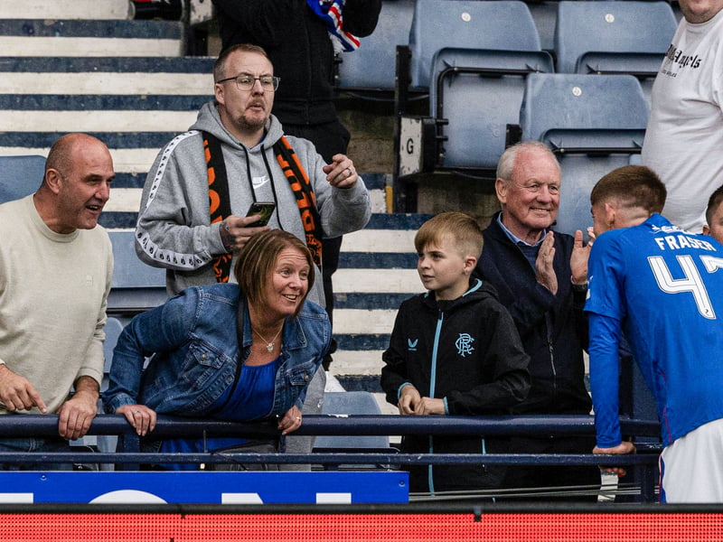 Young Gers ace Robbie Fraser shares a moment at the full-time whistle.