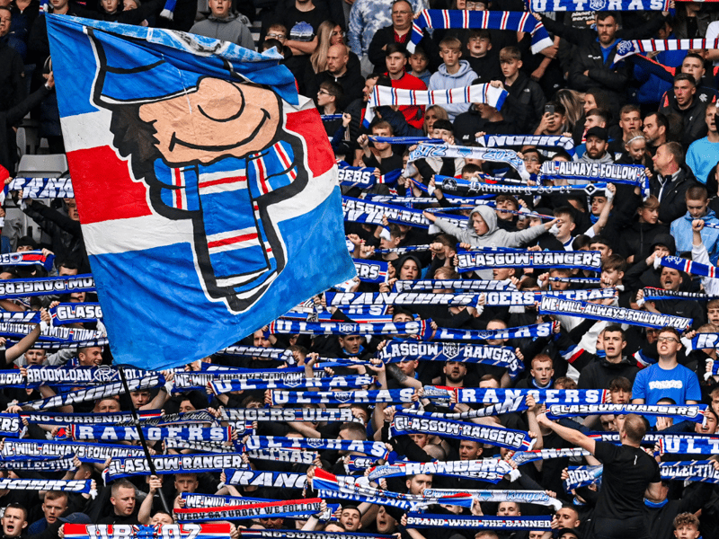 Rangers fans raise their scarves following the win over St Johnstone.