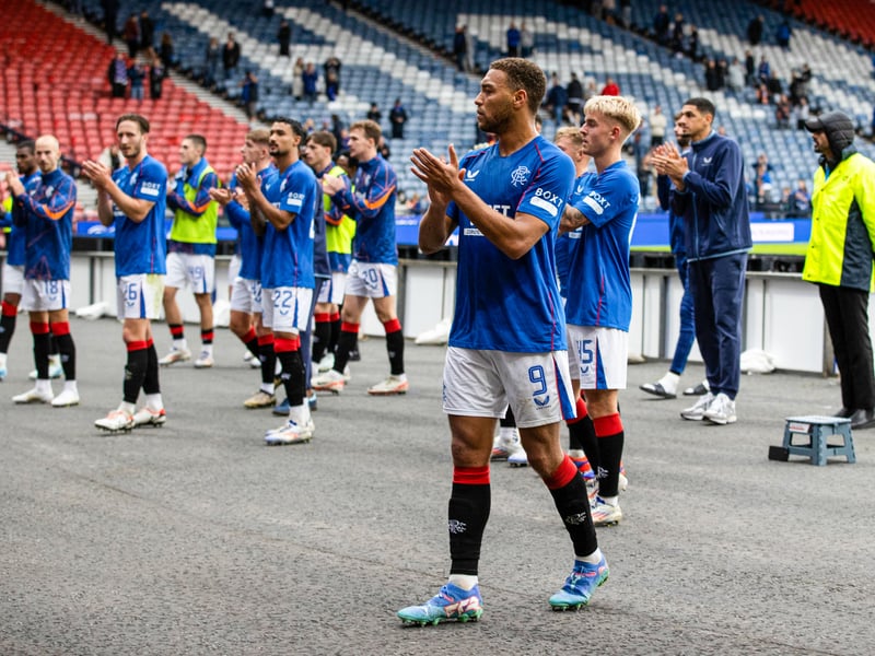 A host of Gers players head over the barrier to say hello to those who stayed to applaud them.