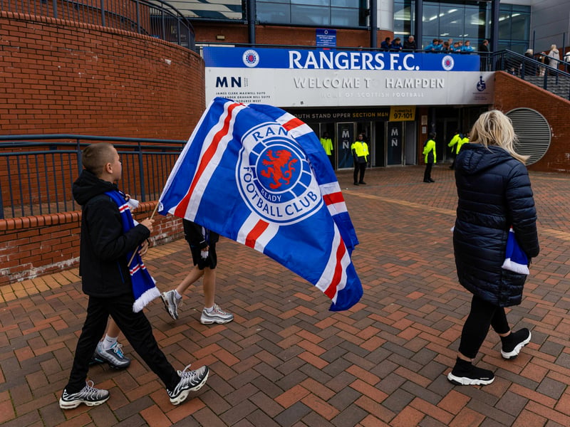 A young fan waves his Rangers flag outside of Hampden Park.