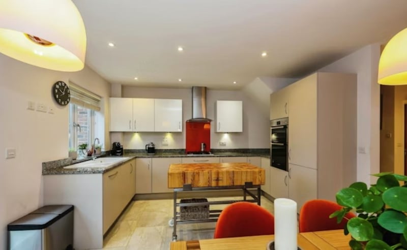 The listing says: "The property is well laid out and offers an attractive open plan ground floor with lounge, dining area and kitchen area with integrated appliances. There is also a downstairs cloakroom."