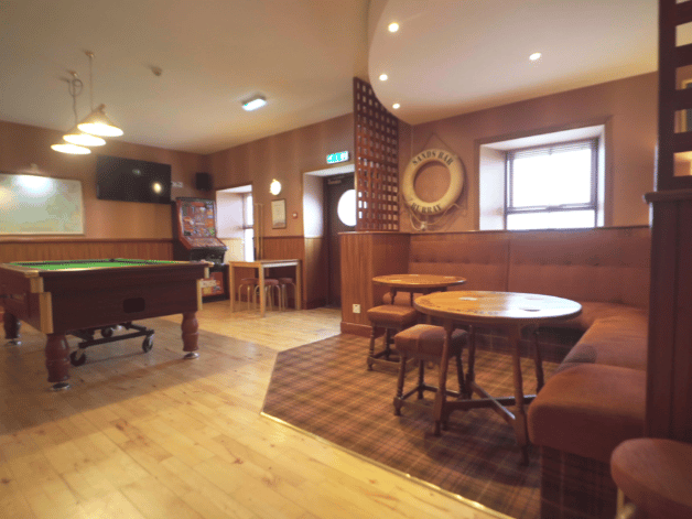 While at the bar, you could enjoy a game or two.