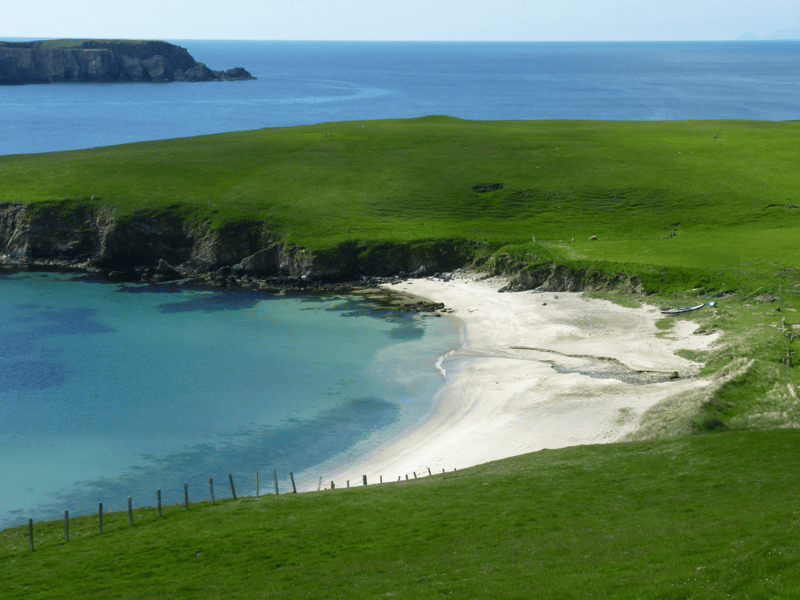 Rerwick Beach.  A beautiful, south-facing sandy bay which manages to keep its peace.