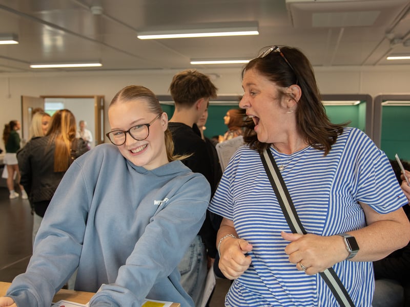 Pupils receive their GCSE results at Woodkirk Academy.
