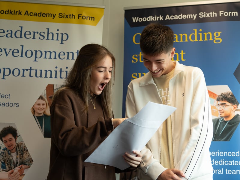 Pupils receive their GCSE results at Woodkirk Academy.