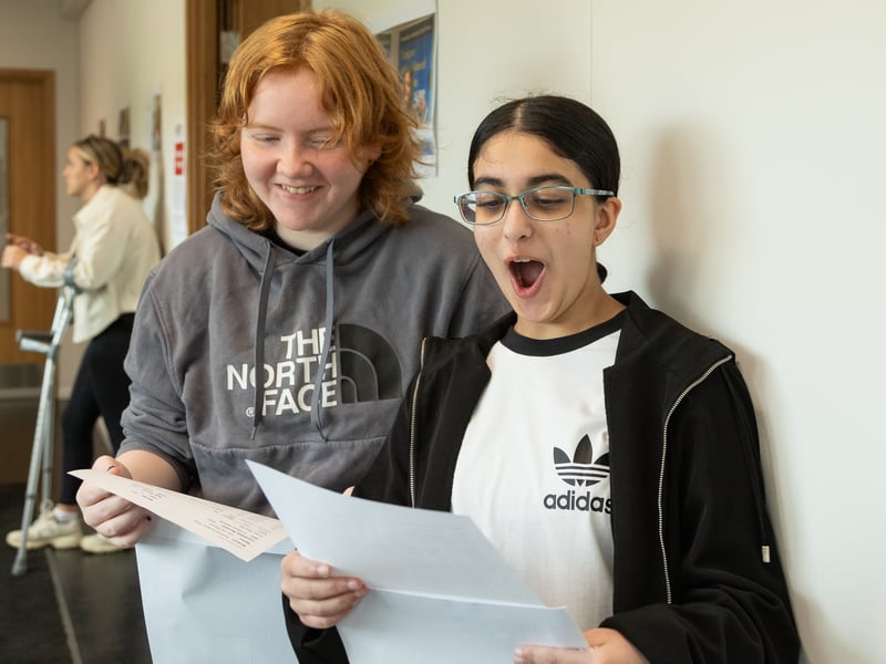 Pupils receive their GCSE results at Woodkirk Academy.