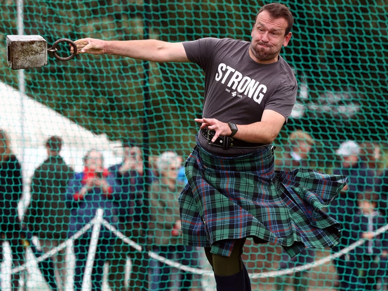 Heavyweight athletes compete during the Argyllshire Gathering on August 22, 2024 in Oban, Scotland