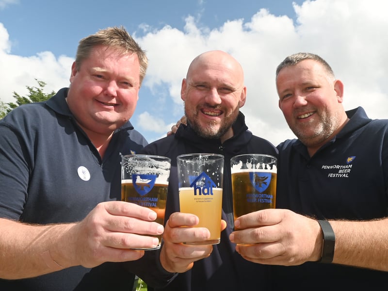 Enjoying a pint in the sun over bank holiday weekend at Penwortham Beef Festival 2024 held at Penwortham Cricket Club.