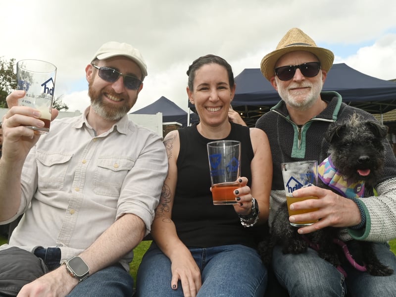 Enjoying a pint in the sun over bank holiday weekend at Penwortham Beef Festival 2024 held at Penwortham Cricket Club.