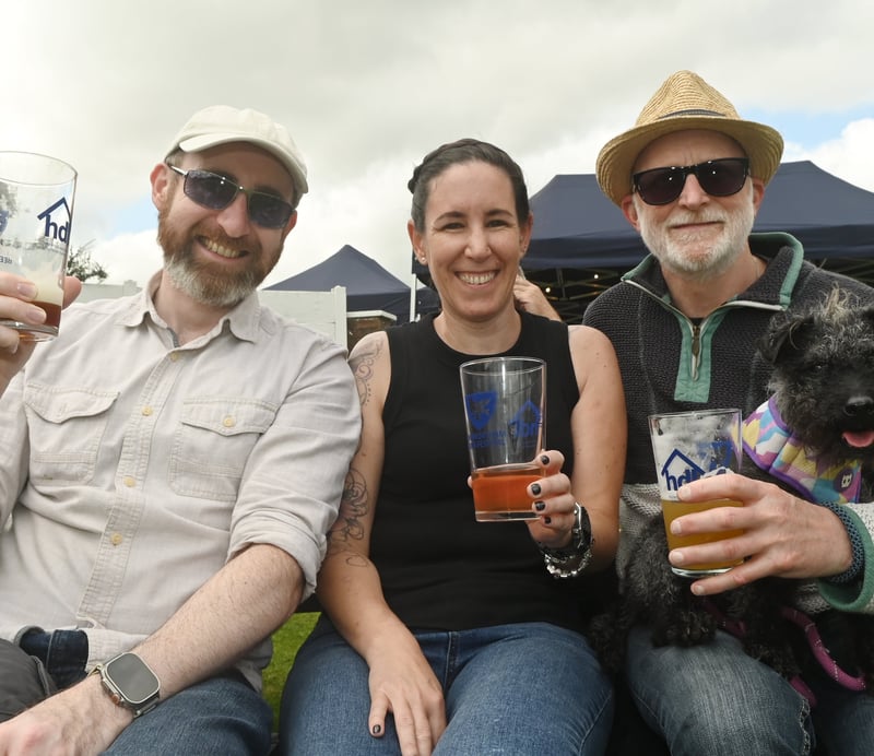 Enjoying a pint in the sun over bank holiday weekend at Penwortham Beef Festival 2024 held at Penwortham Cricket Club.