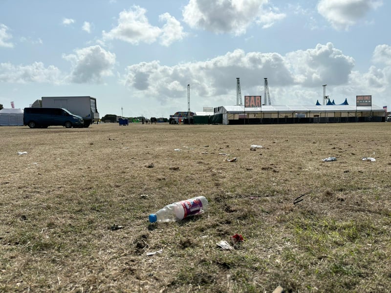 Discarded bottles as the clean-up process begins at the Victorious Festival site.