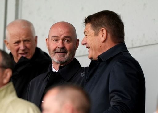 Scotland boss Steve Clarke watches on alongside assistant John Carver.