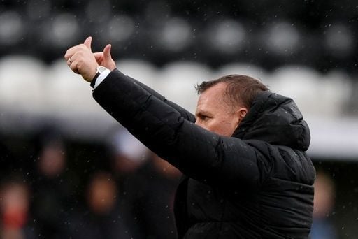 The Celtic boss gives the away end a big thumps up.
