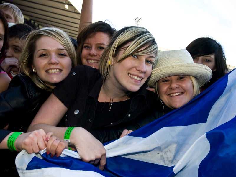 Fans in the front row for Oasis' 2009 Murrayfield Stadium gig.
