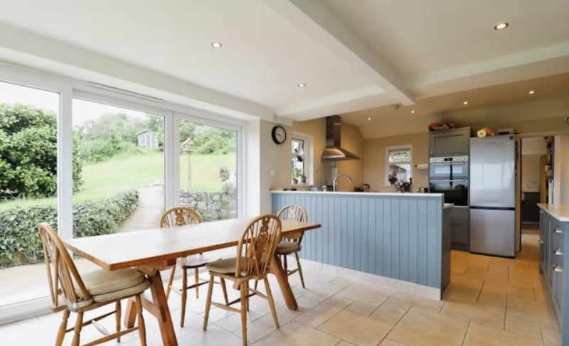 The listing says: "Boasting incredible views of the English Channel and surrounded by stunning countryside, this sizeable home has been upgraded throughout by the current owners."