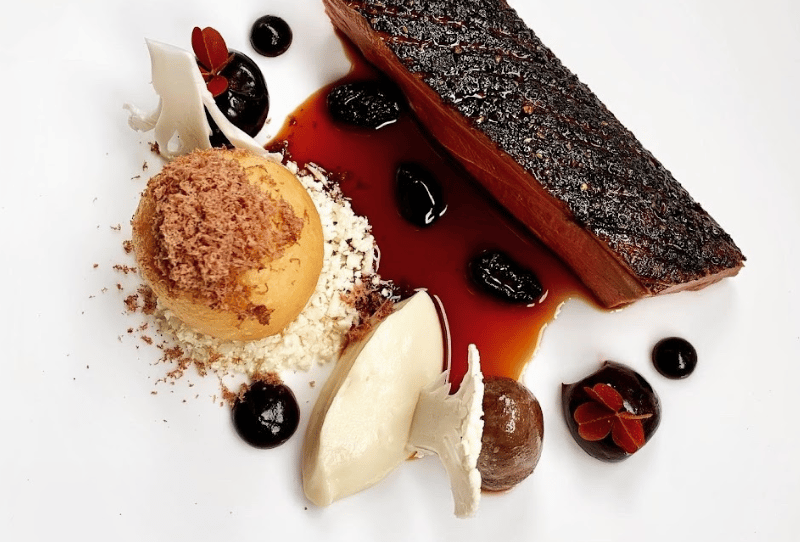 A three AA Rosette restaurant in a charming setting, known for its creative dishes.