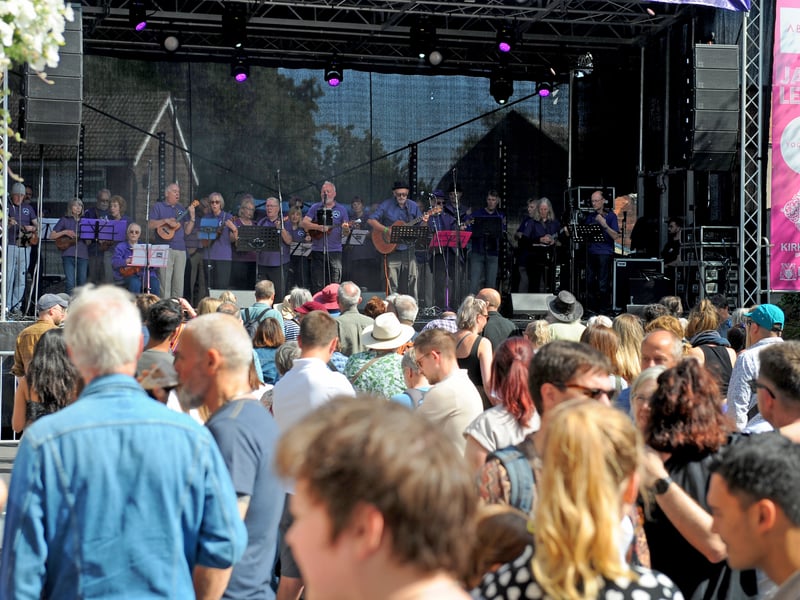 A packed Regent Street watch the Roundhay Ukelele Group.