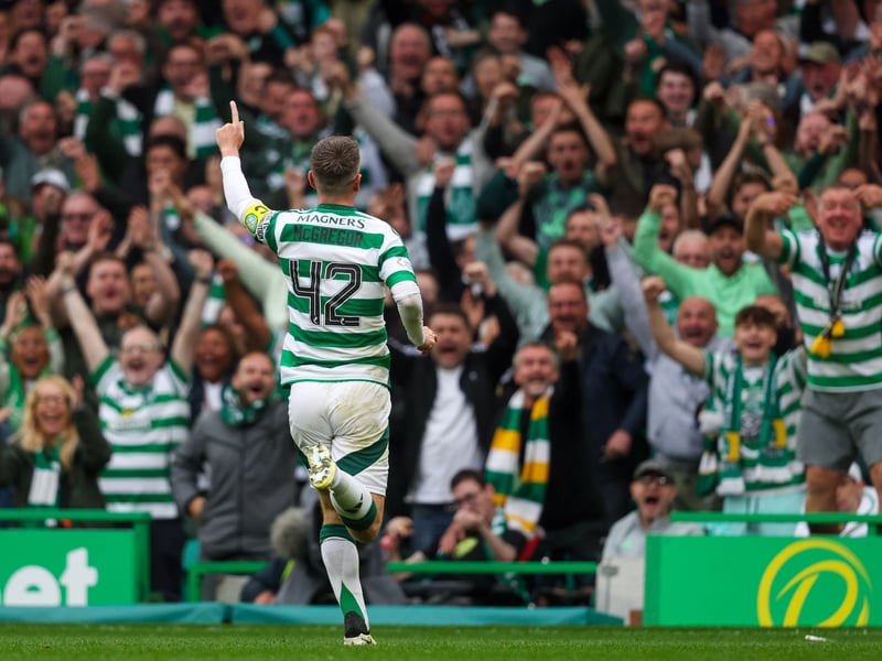 The fans embrace Callum McGregor after his goal.